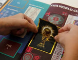 O Kit com 12 Pacotes de Figurinhas Copa do Mundo FIFA 2026